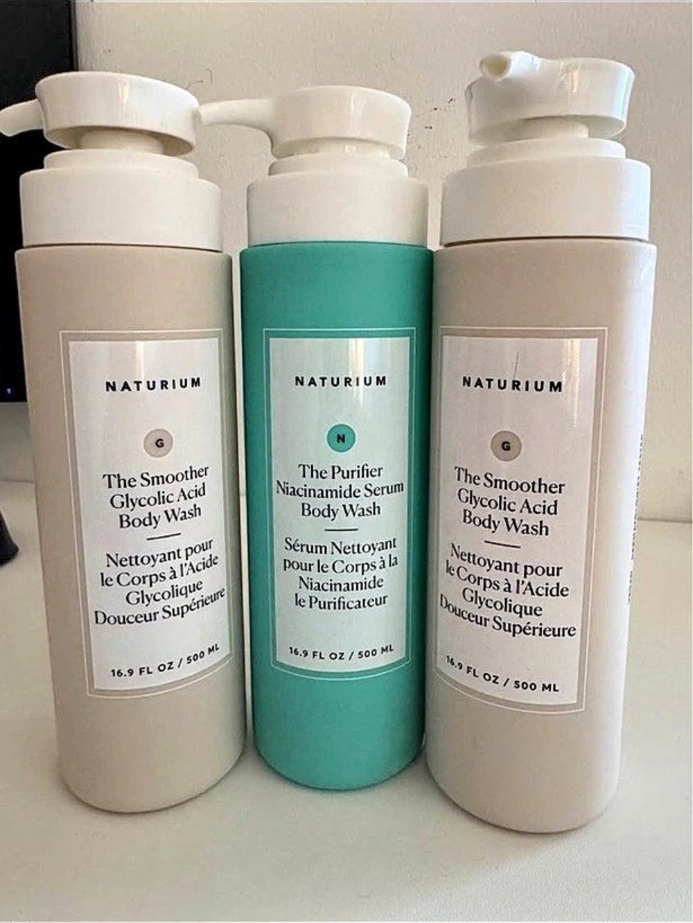 Naturium The Smoother Glycolic Acid Body Wash and The Purifier Niacinamide Serum